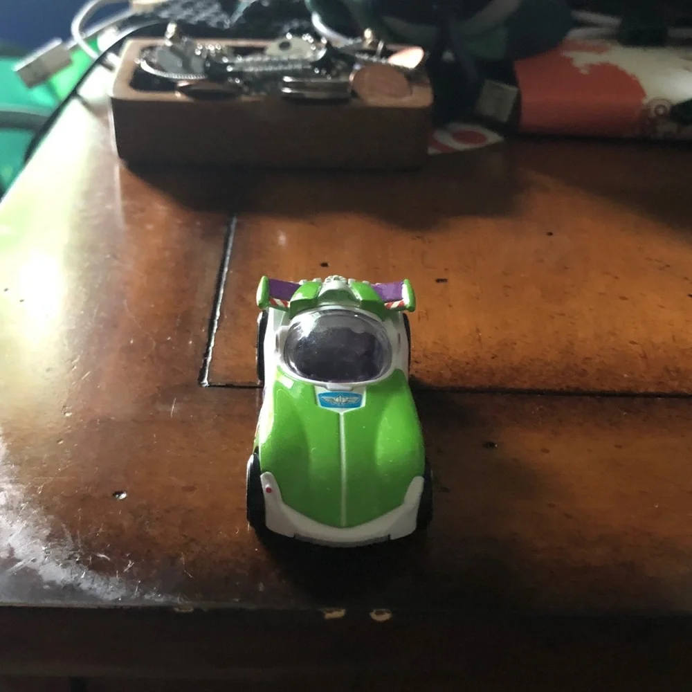 Green Toy Race Car with Purple Accents